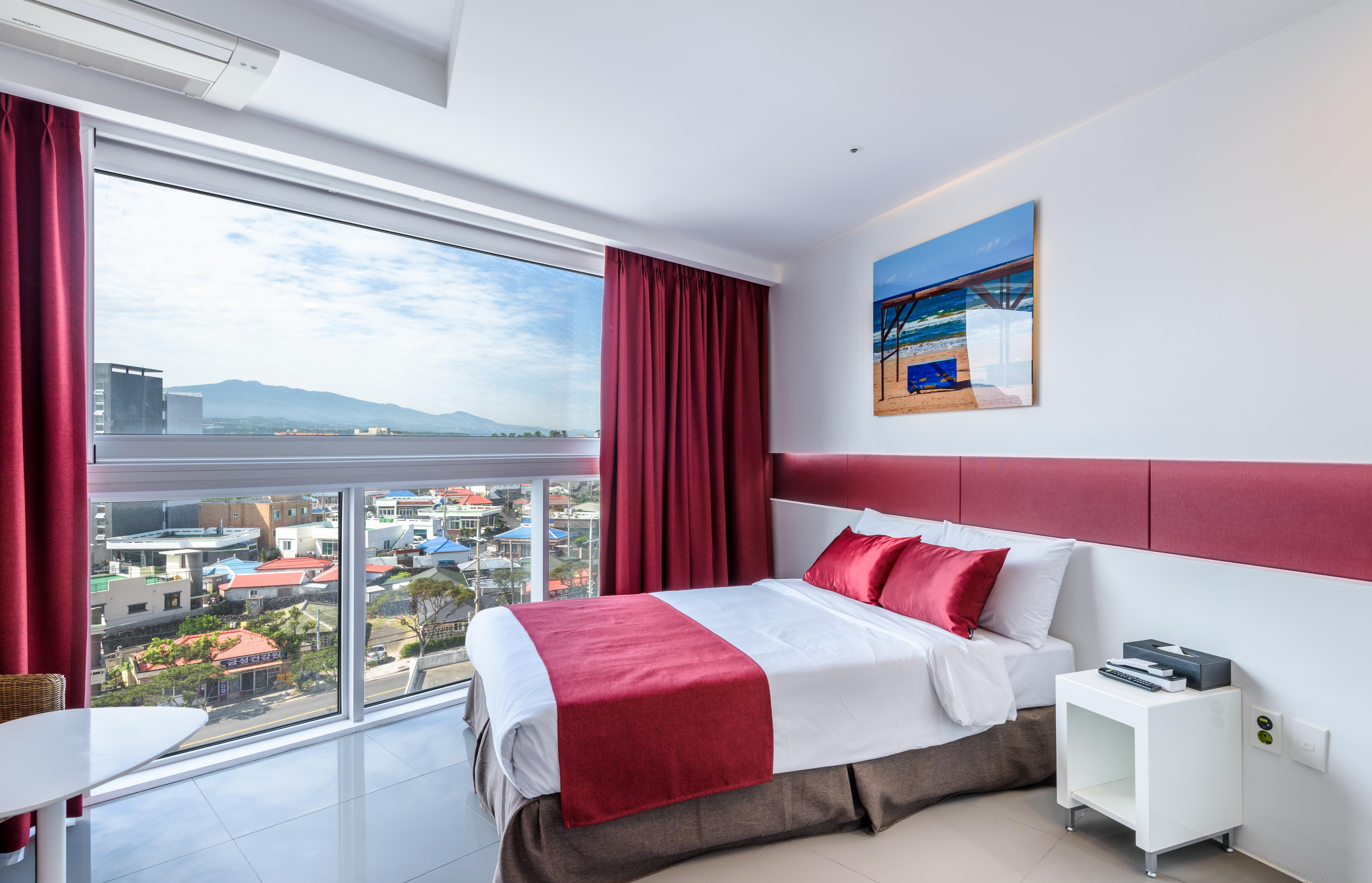 Aimi Jeju Beach Hotel Екстериор снимка