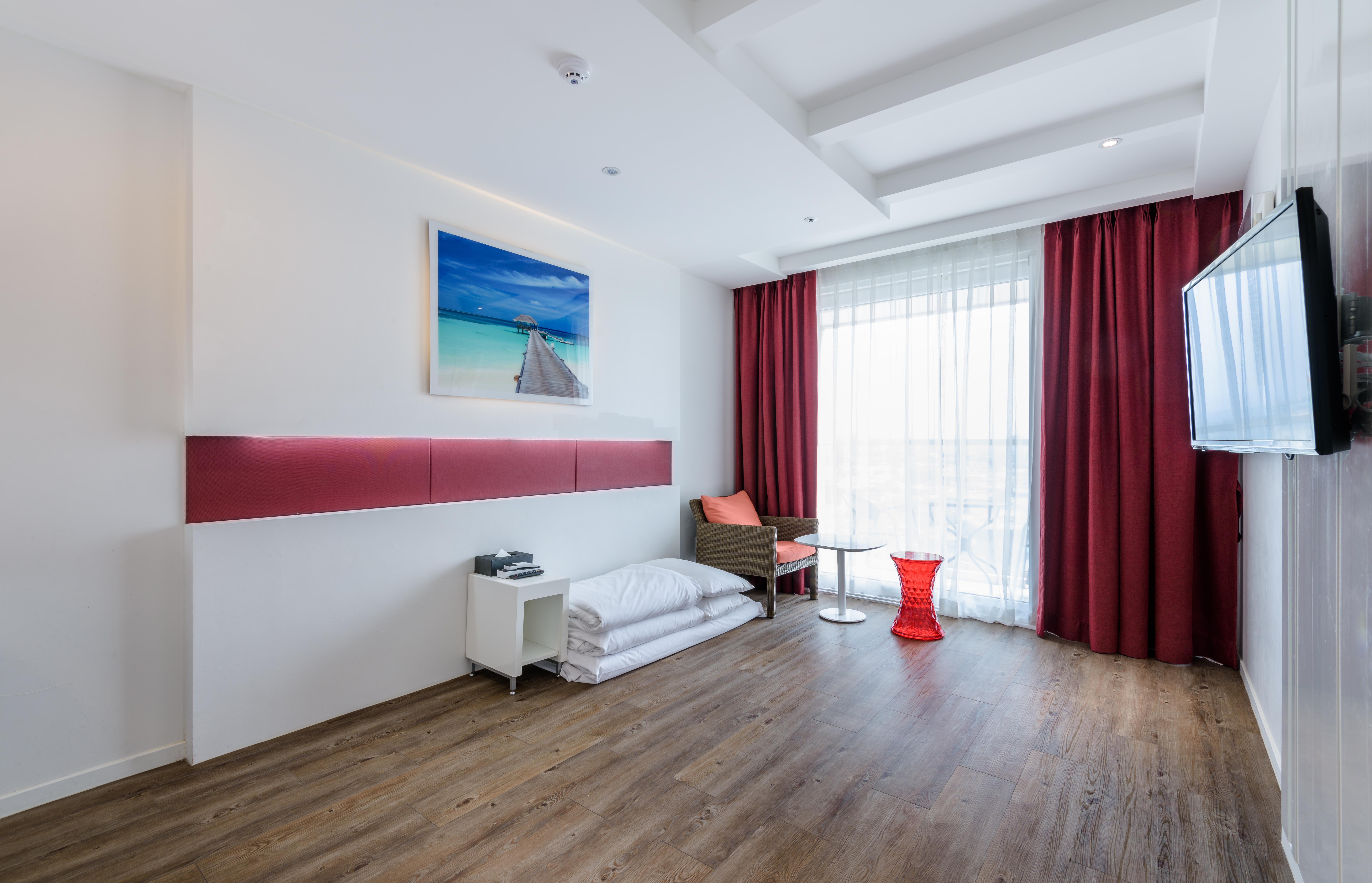 Aimi Jeju Beach Hotel Екстериор снимка