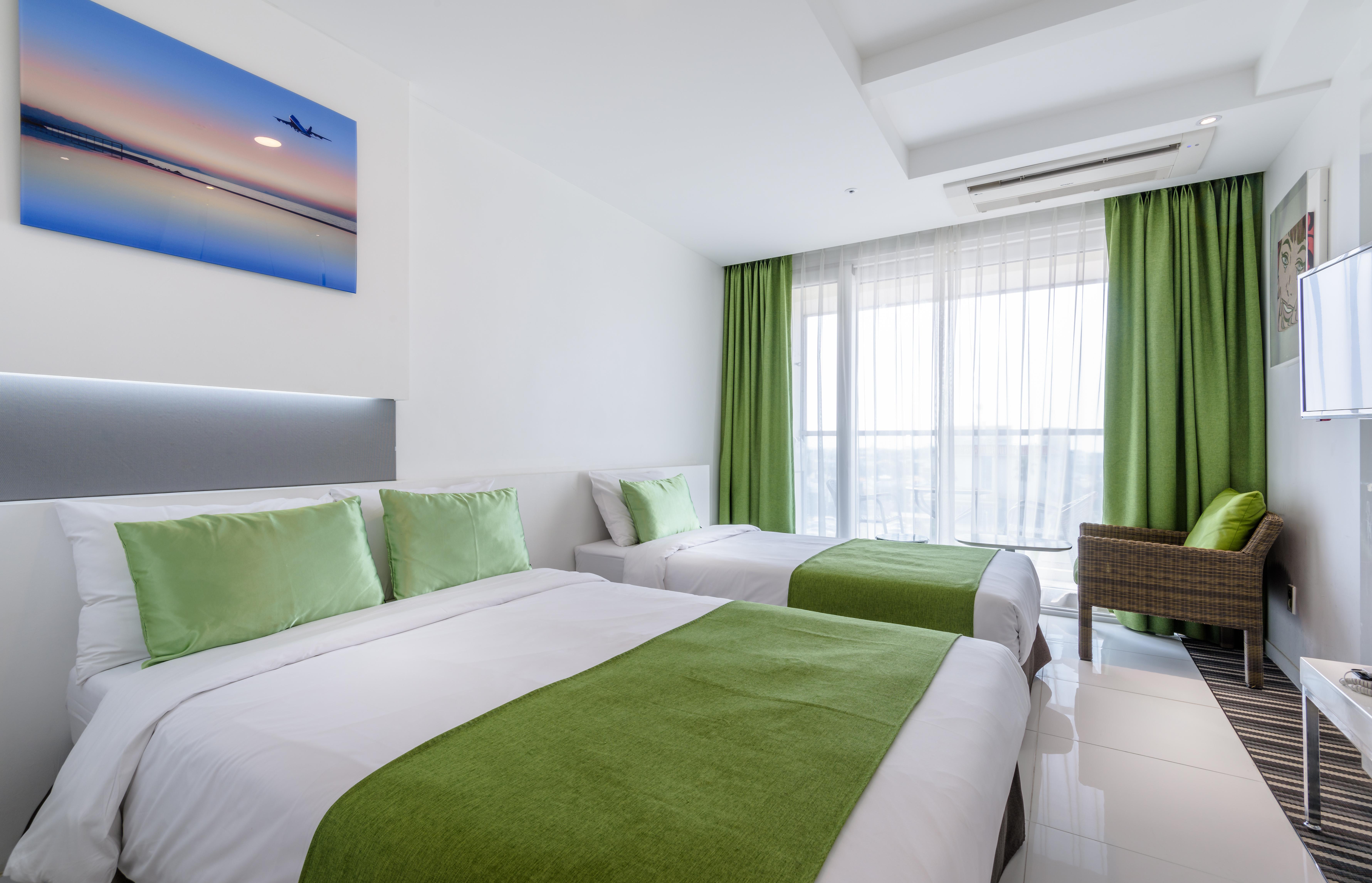 Aimi Jeju Beach Hotel Екстериор снимка