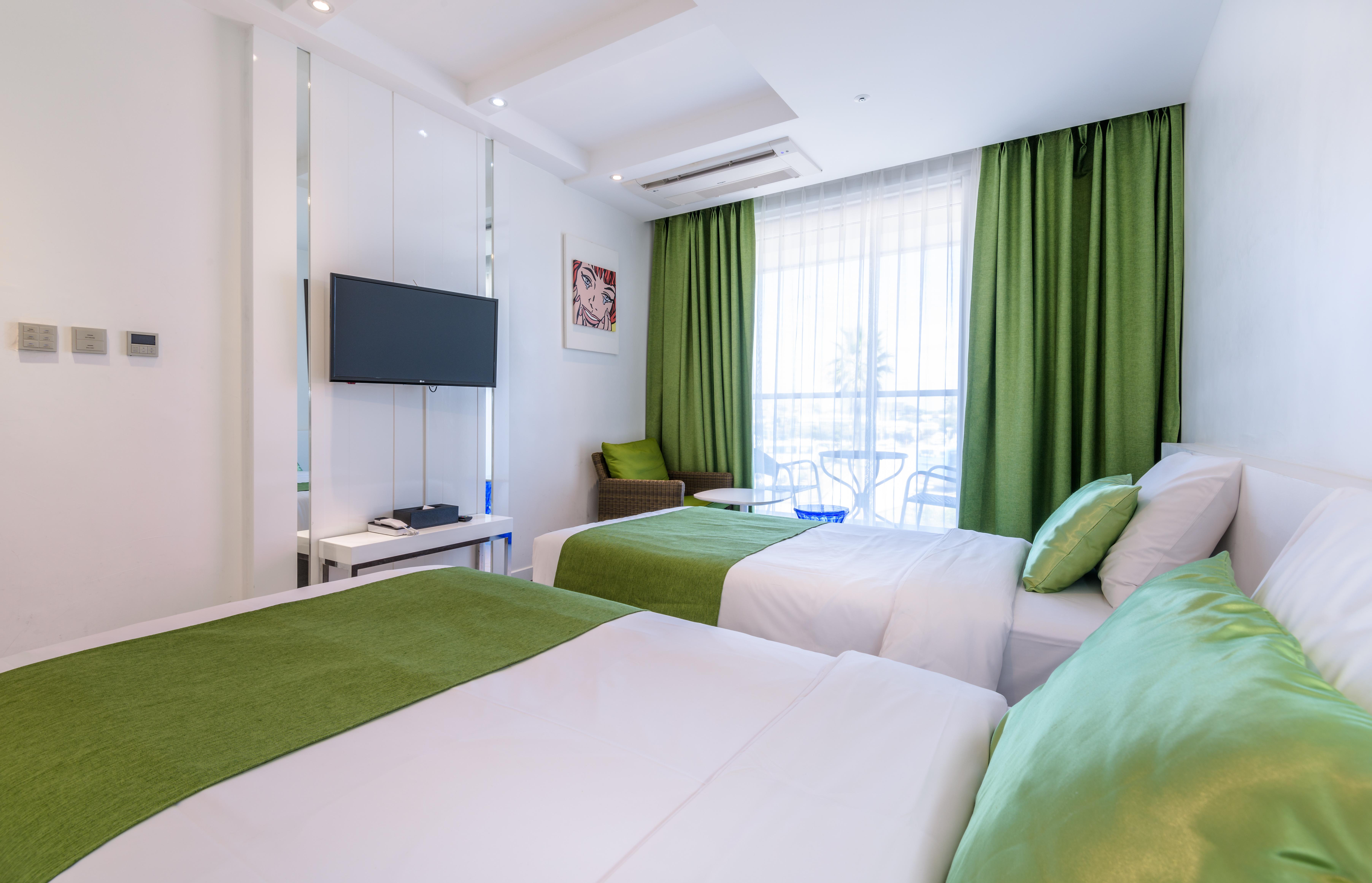 Aimi Jeju Beach Hotel Екстериор снимка